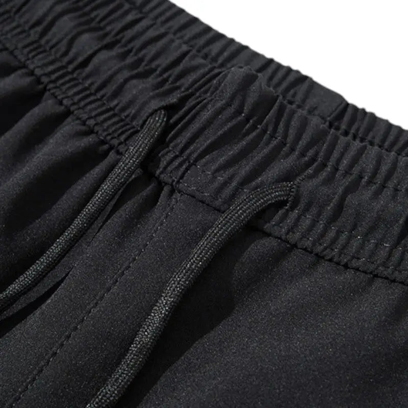 Pantalon trekking coupe-vent